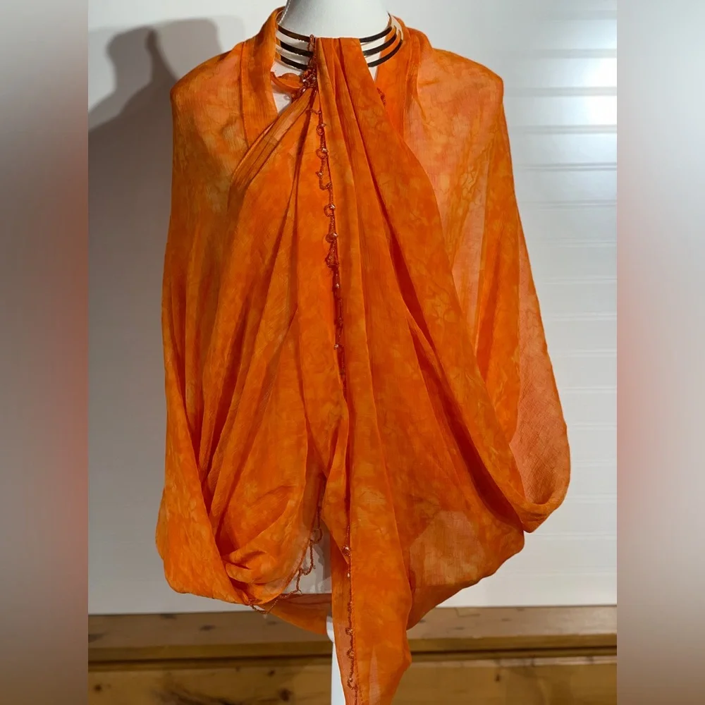 2 beautiful orange scarves‎ bundled. One with beading, then other with sparkle.